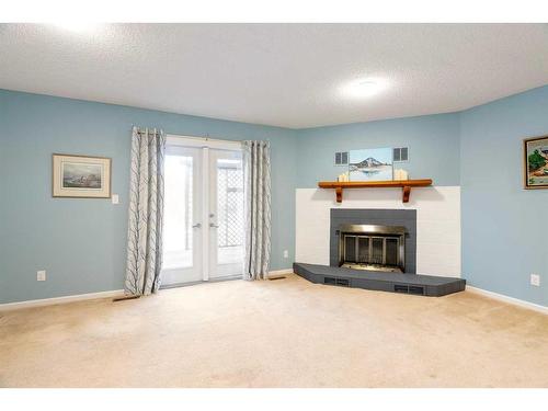 140 Brosseau Crescent, Fort Mcmurray, AB - Indoor Photo Showing Living Room With Fireplace