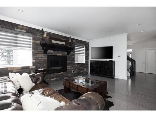 121 Cormorant Place, Fort Mcmurray, AB - Indoor Photo Showing Living Room With Fireplace