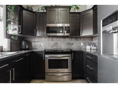 191 Atkinson Lane, Fort Mcmurray, AB - Indoor Photo Showing Kitchen With Upgraded Kitchen