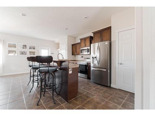 128 Coyote Crescent, Fort Mcmurray, AB - Indoor Photo Showing Kitchen With Stainless Steel Kitchen