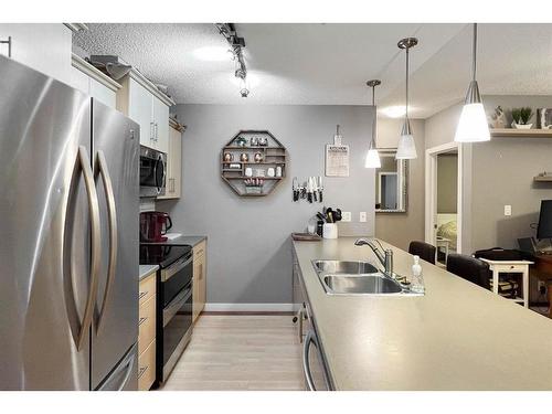 3607-135C Sandpiper Road, Fort Mcmurray, AB - Indoor Photo Showing Kitchen With Double Sink