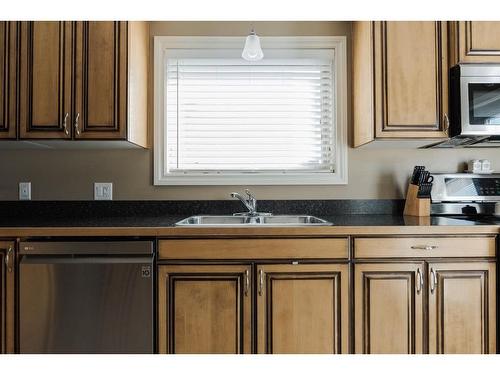 549 Walnut Crescent, Fort Mcmurray, AB - Indoor Photo Showing Kitchen With Double Sink