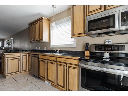 549 Walnut Crescent, Fort Mcmurray, AB - Indoor Photo Showing Kitchen With Stainless Steel Kitchen With Double Sink