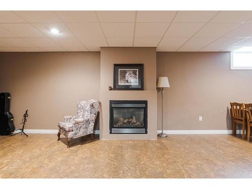 549 Walnut Crescent, Fort Mcmurray, AB - Indoor Photo Showing Basement With Fireplace