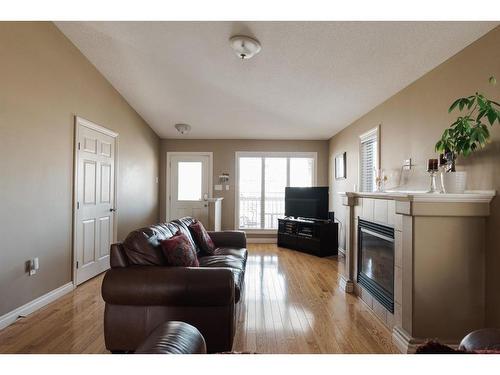 549 Walnut Crescent, Fort Mcmurray, AB - Indoor Photo Showing Living Room With Fireplace