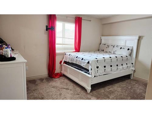 2204-38 Riedel Street, Fort Mcmurray, AB - Indoor Photo Showing Bedroom