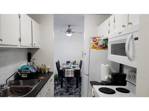 309-13221 Macdonald Drive, Fort Mcmurray, AB - Indoor Photo Showing Kitchen With Double Sink