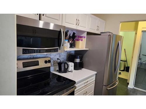 203-100 Richard Street, Fort Mcmurray, AB - Indoor Photo Showing Kitchen
