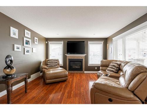 105 Lynx Crescent, Fort Mcmurray, AB - Indoor Photo Showing Living Room With Fireplace