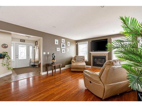 105 Lynx Crescent, Fort Mcmurray, AB - Indoor Photo Showing Living Room With Fireplace