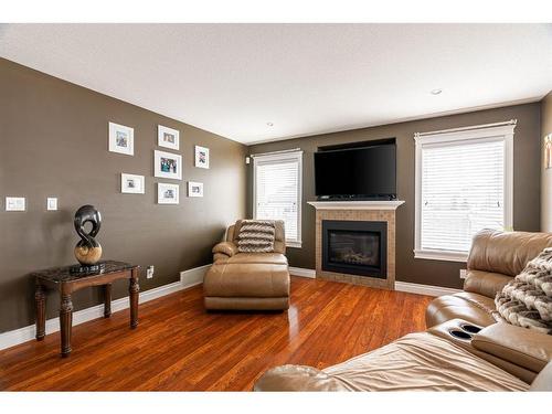 105 Lynx Crescent, Fort Mcmurray, AB - Indoor Photo Showing Living Room With Fireplace