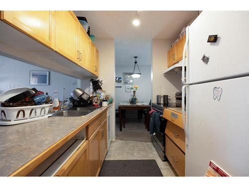 541-200 Richard Street, Fort Mcmurray, AB - Indoor Photo Showing Kitchen With Double Sink