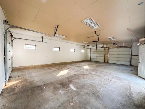 141 Cheecham Court, Anzac, AB - Indoor Photo Showing Garage