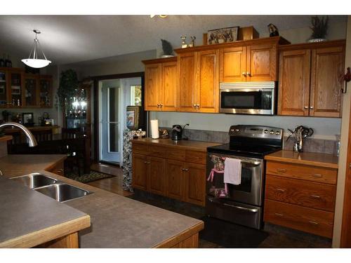 67305 144A Range Road, Lac La Biche, AB - Indoor Photo Showing Kitchen With Double Sink