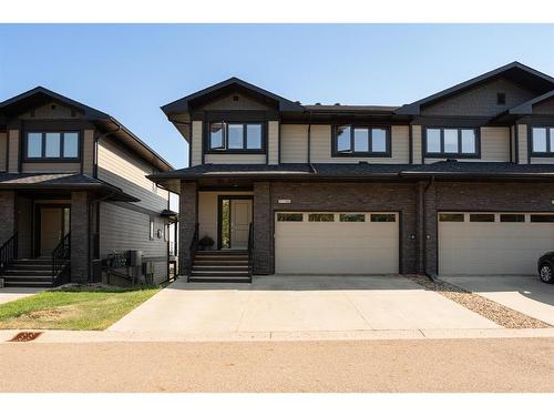 16-208 Sparrow Hawk Drive, Fort Mcmurray, AB - Outdoor With Facade