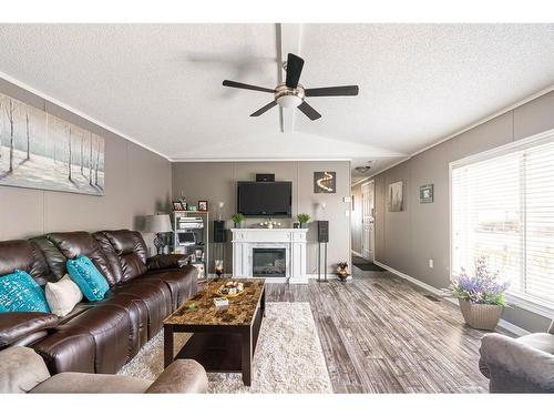 164 Caouette Crescent, Fort Mcmurray, AB - Indoor Photo Showing Living Room With Fireplace