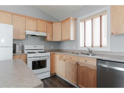 101 Steeves Bay, Fort Mcmurray, AB - Indoor Photo Showing Kitchen With Double Sink