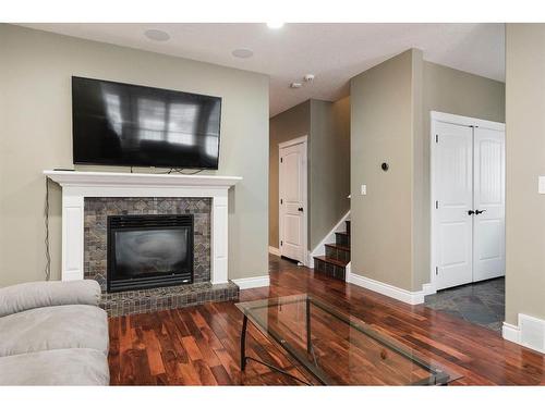 128 Elderberry Street, Fort Mcmurray, AB - Indoor Photo Showing Living Room With Fireplace