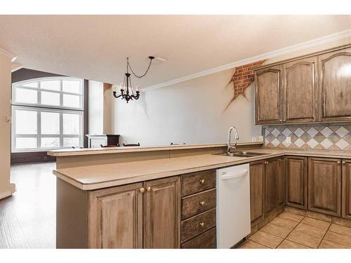 403-10101 Morrison Street, Fort Mcmurray, AB - Indoor Photo Showing Kitchen With Double Sink