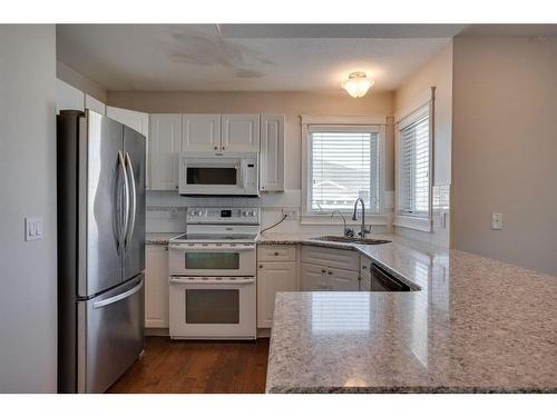 13-264 J.W Mann Drive, Fort Mcmurray, AB - Indoor Photo Showing Kitchen With Double Sink