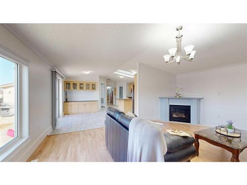 101 Fir Street, Fort Mcmurray, AB - Indoor Photo Showing Living Room With Fireplace