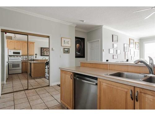307-10101 Morrison Street, Fort Mcmurray, AB - Indoor Photo Showing Kitchen With Double Sink