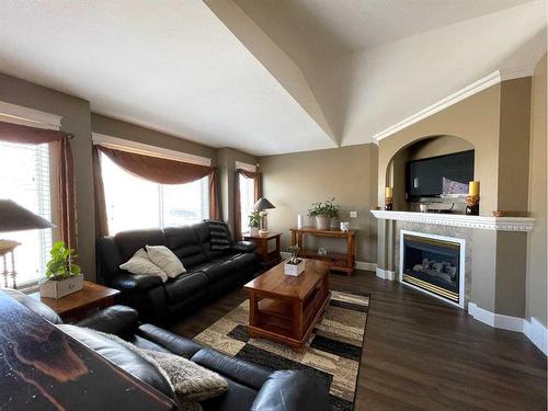 157 Black Bear Crescent, Fort Mcmurray, AB - Indoor Photo Showing Living Room With Fireplace