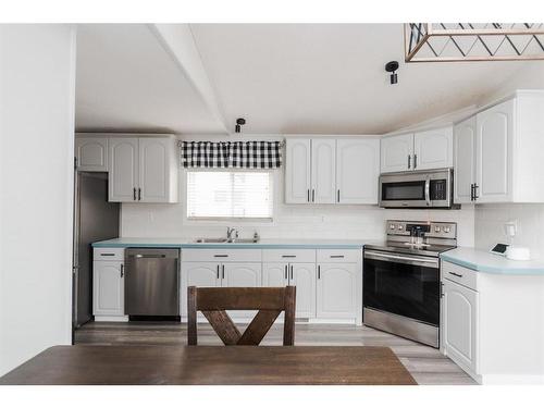 188 Caouette Crescent, Fort Mcmurray, AB - Indoor Photo Showing Kitchen With Double Sink