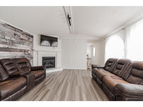 188 Caouette Crescent, Fort Mcmurray, AB - Indoor Photo Showing Living Room With Fireplace