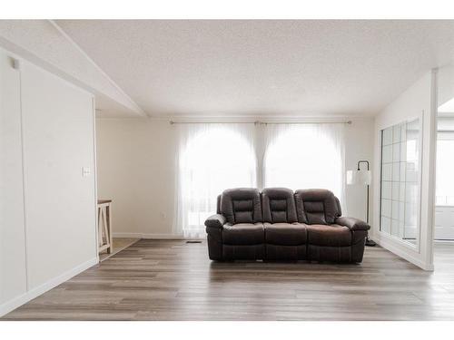 188 Caouette Crescent, Fort Mcmurray, AB - Indoor Photo Showing Living Room With Fireplace