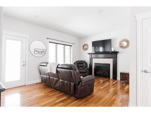 108 Crane Rise, Fort Mcmurray, AB - Indoor Photo Showing Living Room With Fireplace