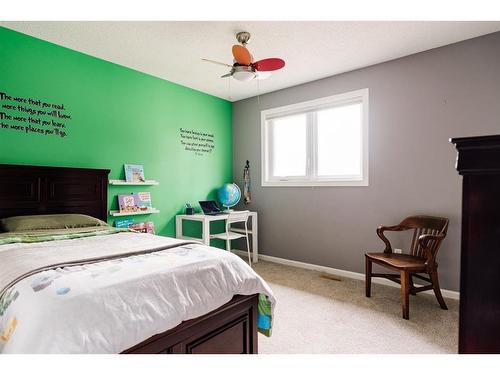 180 Brosseau Crescent, Fort Mcmurray, AB - Indoor Photo Showing Bedroom