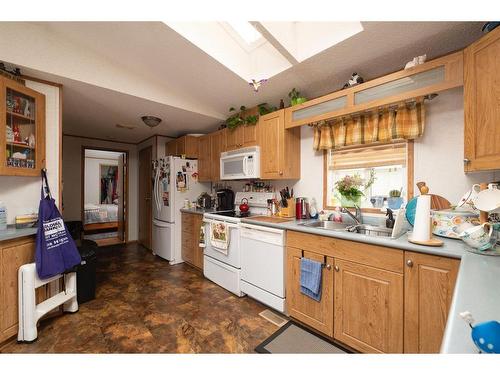 240 Palomino Close, Fort Mcmurray, AB - Indoor Photo Showing Kitchen With Double Sink