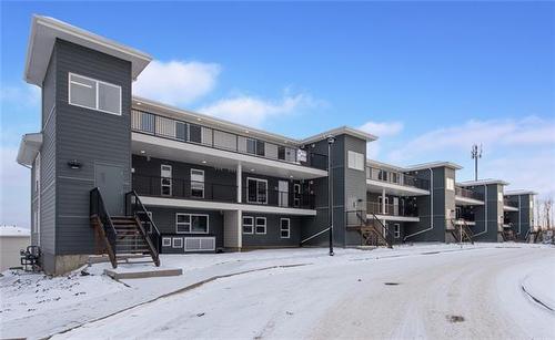 332-201 Abasand Drive, Fort Mcmurray, AB - Outdoor With Facade