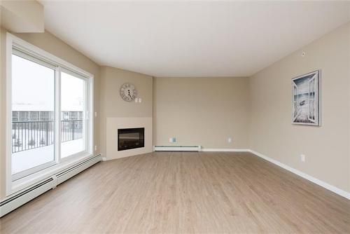332-201 Abasand Drive, Fort Mcmurray, AB - Indoor With Fireplace