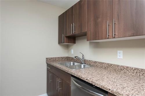 332-201 Abasand Drive, Fort Mcmurray, AB - Indoor Photo Showing Kitchen With Double Sink