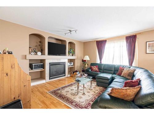 317 Archibald Close, Fort Mcmurray, AB - Indoor Photo Showing Living Room With Fireplace