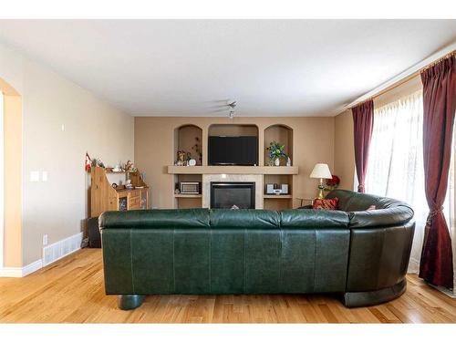 317 Archibald Close, Fort Mcmurray, AB - Indoor Photo Showing Living Room With Fireplace