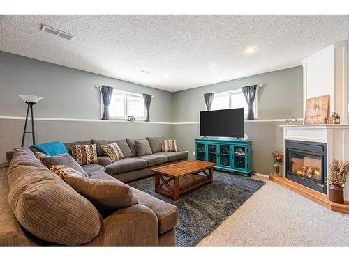 164 Bacon Place, Fort Mcmurray, AB - Indoor Photo Showing Living Room With Fireplace
