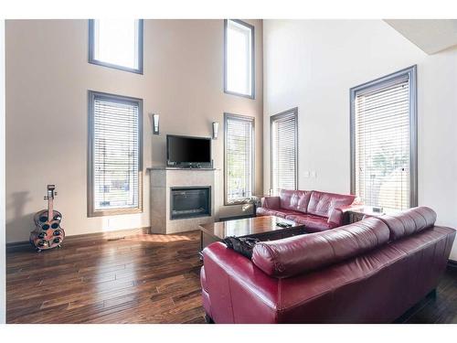 100 Macrae Place, Fort Mcmurray, AB - Indoor Photo Showing Living Room With Fireplace