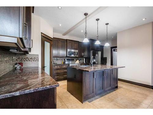 100 Macrae Place, Fort Mcmurray, AB - Indoor Photo Showing Kitchen With Upgraded Kitchen