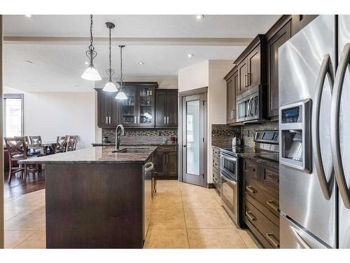 100 Macrae Place, Fort Mcmurray, AB - Indoor Photo Showing Kitchen With Upgraded Kitchen