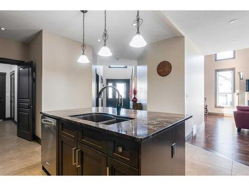 100 Macrae Place, Fort Mcmurray, AB - Indoor Photo Showing Kitchen With Double Sink With Upgraded Kitchen