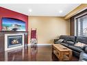 116 Chestnut Way, Fort Mcmurray, AB  - Indoor Photo Showing Living Room With Fireplace 