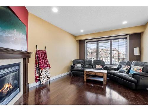 116 Chestnut Way, Fort Mcmurray, AB - Indoor Photo Showing Living Room With Fireplace