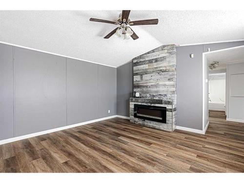 381 Cree Road, Fort Mcmurray, AB - Indoor Photo Showing Living Room With Fireplace