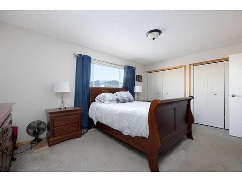 106 Silver Springs Drive, Fort Mcmurray, AB - Indoor Photo Showing Bedroom