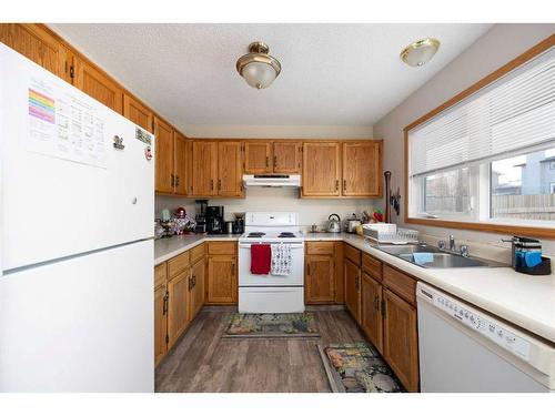106 Silver Springs Drive, Fort Mcmurray, AB - Indoor Photo Showing Kitchen With Double Sink