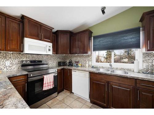 177 Greely Road, Fort Mcmurray, AB - Indoor Photo Showing Kitchen With Double Sink