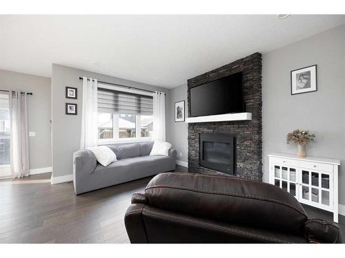 115 Airmont Court, Fort Mcmurray, AB - Indoor Photo Showing Living Room With Fireplace